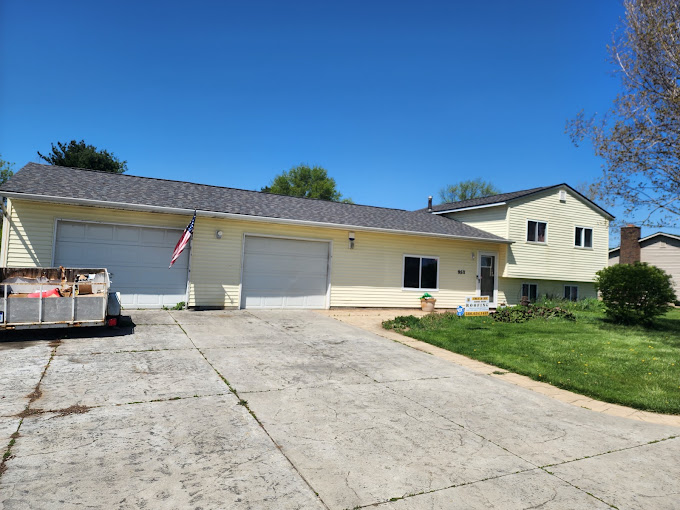 Home exterior with new gutters